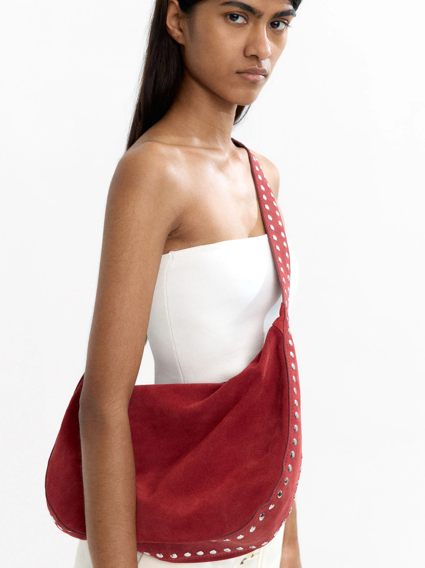 Leather shoulder bag with studs